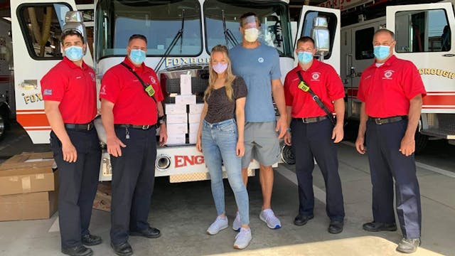 Foxborough firefighters with former New England Patriots star Rob Gronkowski and model Camille Kostek.