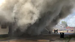 New Orleans firefighters battle a smoke-heavy 3-alarm fire in Treme on Friday, May 22, 2020.