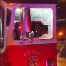 Atlanta fire apparatus were damaged as crews battled a restaurant blaze near Lenox Mall overnight Friday. It was one of multiple calls firefighters responded to during protests around the city.