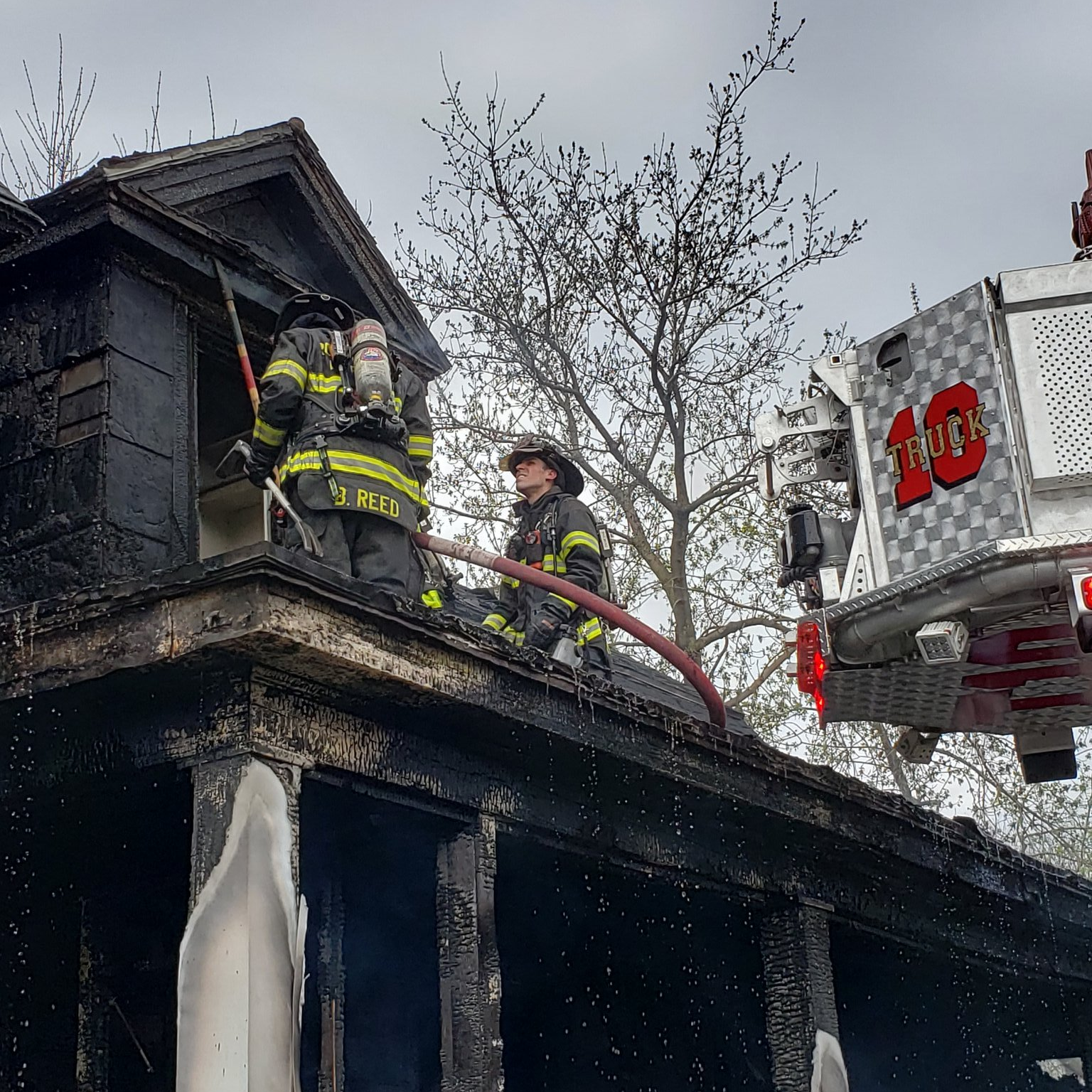 Two Rochester, NY, firefighters were injured during a two-alarm house fire Saturday.