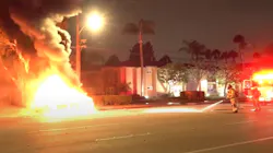 Anaheim, CA, firefighters extinguish a blaze that started when Illegal fireworks exploded inside a car May 29, setting off other pyrotechnics inside the vehicle.