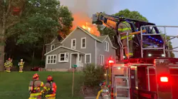 Firefighters rescued two people from a burning Chippewa Falls, WI, residential building early Sunday.