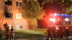 Cleveland firefighters rescued a mother and child from a burning third-story apartment on the city's east side early Thursday.