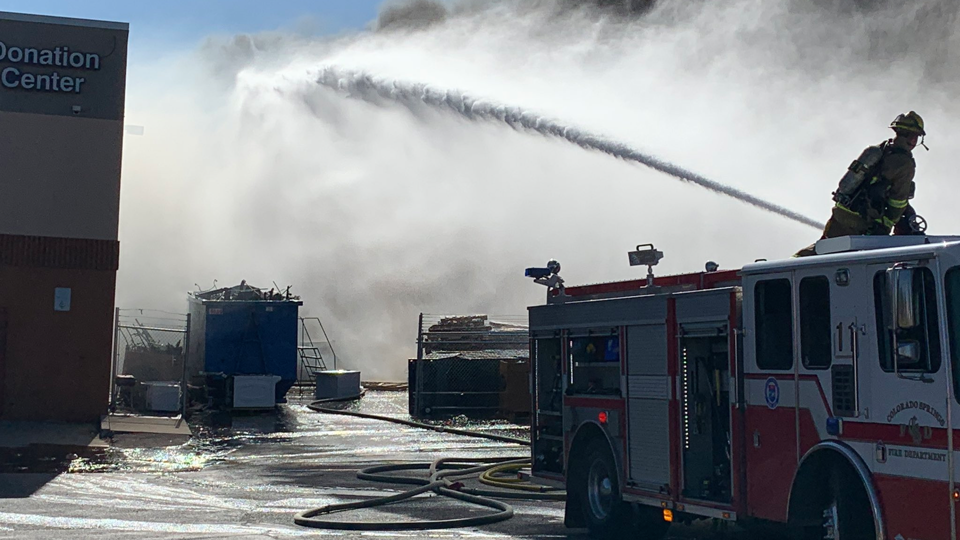 Eighty Colorado Springs, CO, firefighters worked to put out a four-alarm blaze at a Goodwill store Sunday.