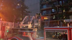 Firefighters rescued apartment residents from their balconies during a two-alarm blaze in Washington, D.C., on Friday night. Firefighters rescued apartment residents from their balconies during a two-alarm blaze in Washington, D.C., on Friday night.