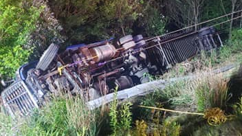 Hazle Township, PA, firefighters used ropes and called in a heavy wrecker to rescue a driver who drove his tractor-trailer into an embankment and rolled the vehicle on its side early Tuesday.