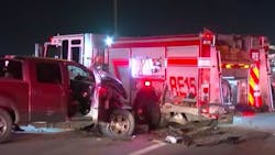 A pickup truck struck a Houston fire apparatus being used as a blocker while firefighters work at a previous accident scene Feb. 8.