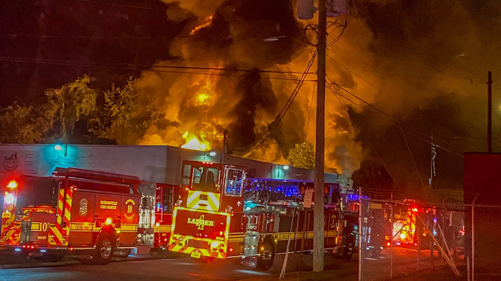 Around 60 Jacksonville, FL, firefighters were able to save the back half of the building as a commercial building partially destroyed a structure early Friday.