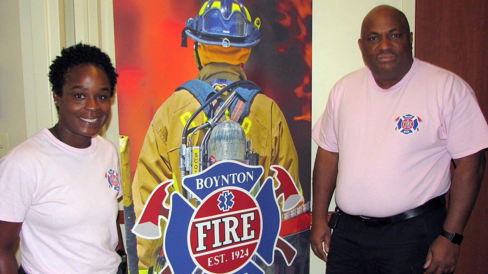 Latosha Clemons, Boynton Beach, FL, Fire Rescue's first black female firefighter, and Chief Glenn Joseph.