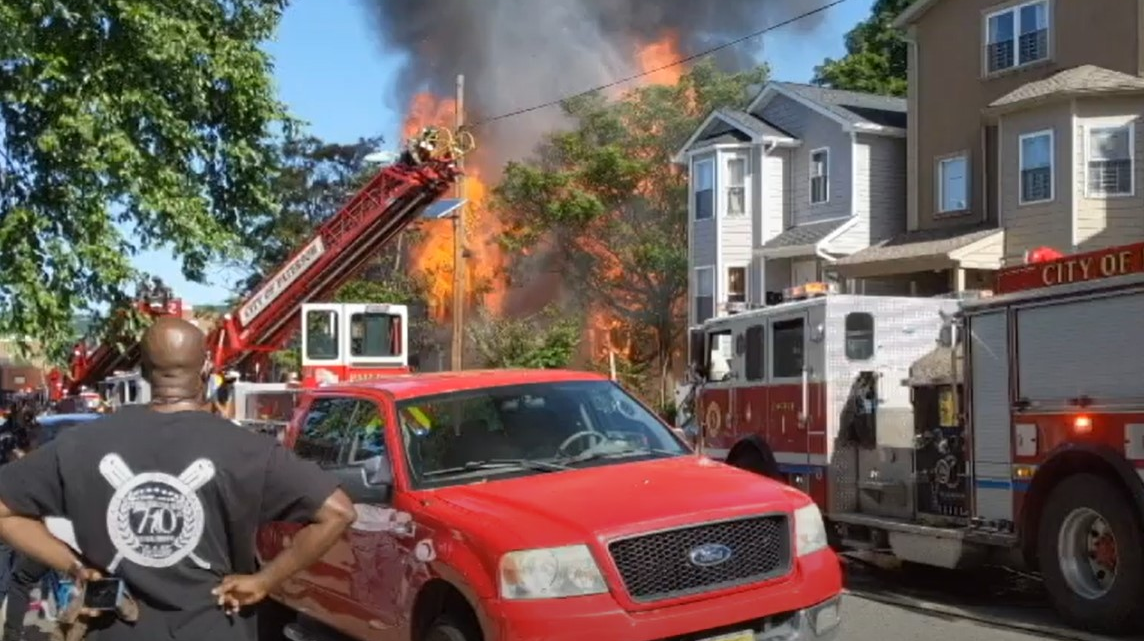 Two Paterson, NJ, firefighters suffered non-life-threatening injuries during a three-alarm blaze Friday.