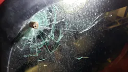 Plum Grove, TX, fire officials placed what appeared to be a 40-caliber round in a bullet hole in the windshiled of a fire apparatus to see if it was a match. The bullet was discovered near the vehicle after shots were fired near the station Thursday.