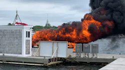 Firefighters from multiple departments stopped a boat fire spreading to the rest of Bridge Marina in Salisbury, MA, on Wednesday.