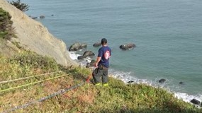 San Francisco firefighters used ropes to rescue a man who fell from a cliff Friday.