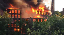 Multiple departments responded to a two-alarm blaze that broke out at the vacant Star Pin factory in Shelton, CT, on Saturday.
