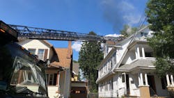 Two Springfield, MA, firefighters were burned while ventilating a burning three-story house Monday. Two Springfield, MA, firefighters were burned while ventilating a burning three-story house Monday.