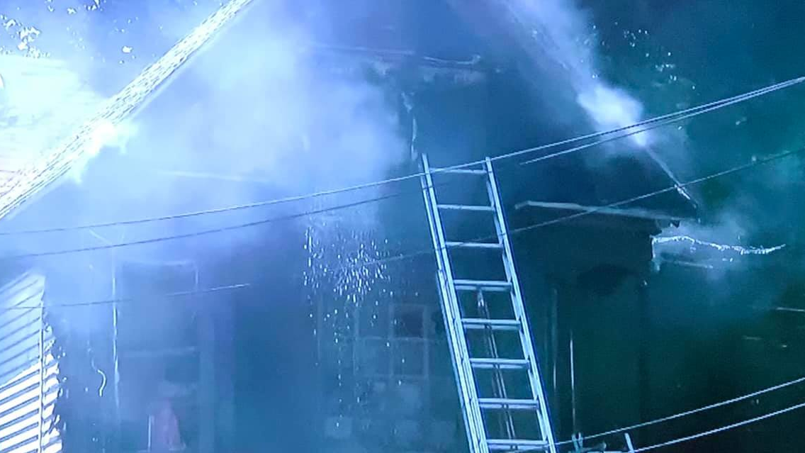 Syracuse, NY, firefighters put out a house fire that extensively damaged the structure Wednesday.