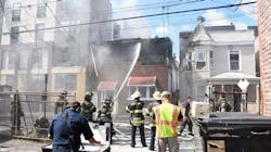 North Hudson Regional Fire and Rescue members respond to a three-alarm fire Wednesday on 54th Street in West New York, NJ. North Hudson Regional Fire and Rescue members respond to a three-alarm fire Wednesday on 54th Street in West New York, NJ.