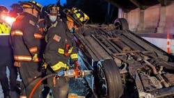 Westport, CT, firefighters extricated a trapped occupant before the car the person was in caught fire late Sunday. Westport, CT, firefighters extricated a trapped occupant before the car the person was in caught fire late Sunday.