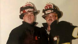 Roslyn Rescue Allen R. &ldquo;Big Al&rdquo; Frye (left) and Frank Calo at a 2000 fire.