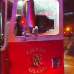 An Atlanta fire apparatus was vandalized while firefighters responded to a restaurant blaze near Lenox Mall on Friday.