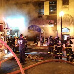 Chicago firefighters battle a two-alarm blaze on Wabash Avenue late Saturday. Crews responded to 85 fires between late Saturday and early Monday, a record number for the department.