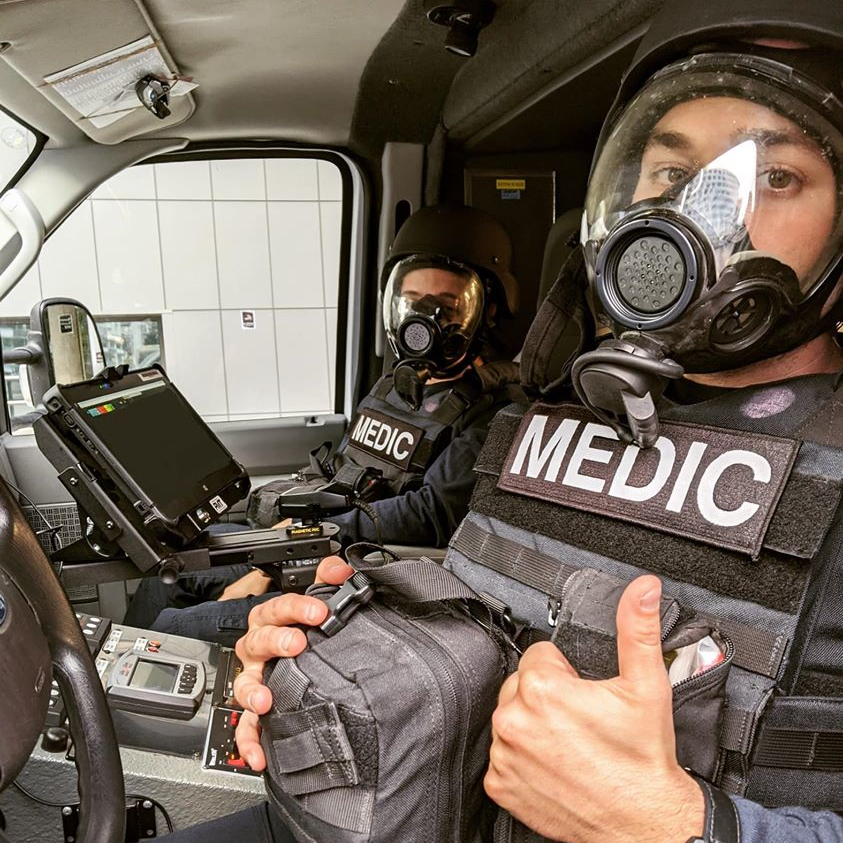 EMTs for Denver Health Paramedics prepare to respond to calls during protests and riots in the city in late May.