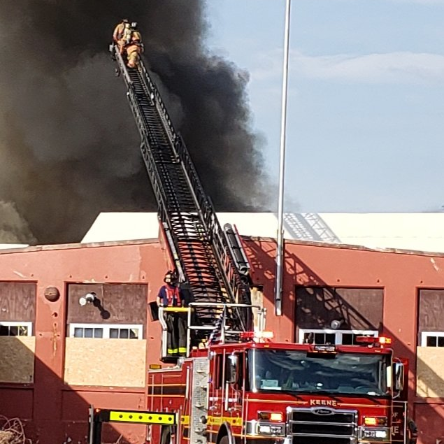 Firefighters from at least 25 regional departments spent hours late Sunday and early Monday battling a five-alarm blaze at an abandoned warehouse in Jaffrey, NH.