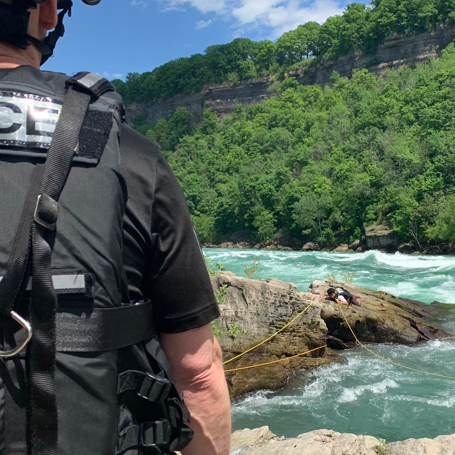 A man who became trapped on rocks in the Niagara Gorge is rescued by marine unit crews on June 6, 2020.