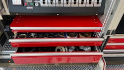 A closer view of a unique storage option at the operator’s panel. In addition to this storage, no intakes or discharges were specified for this area. A closer view of a unique storage option at the operator’s panel. In addition to this storage, no intakes or discharges were specified for this area.