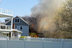 A significant wind of some 20–30 mph plagued the incident, including causing a similar neighboring structure to become involved. The second structure's involvement contributed to confusion that led to a firefighter being cut off from other members. A significant wind of some 20–30 mph plagued the incident, including causing a similar neighboring structure to become involved. The second structure's involvement contributed to confusion that led to a firefighter being cut off from other members.