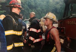 Allen R. Frye and Peter Liotta at a building fire in Roslyn in 2000.
