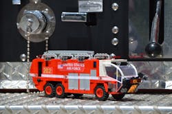 Many of the parts that are used in the construction of fire apparatus out of Lego blocks are standard issue, if you will. However, Braun often uses model paint or spray paint to exactly replicate a color hue of a department’s vehicles, and he sometimes finds the need to search beyond the Lego world for parts, such as the thin plastic that he found at a home improvement retailer to fashion the windshield of this replica AARF. Many of the parts that are used in the construction of fire apparatus out of Lego blocks are standard issue, if you will. However, Braun often uses model paint or spray paint to exactly replicate a color hue of a department’s vehicles, and he sometimes finds the need to search beyond the Lego world for parts, such as the thin plastic that he found at a home improvement retailer to fashion the windshield of this replica AARF.