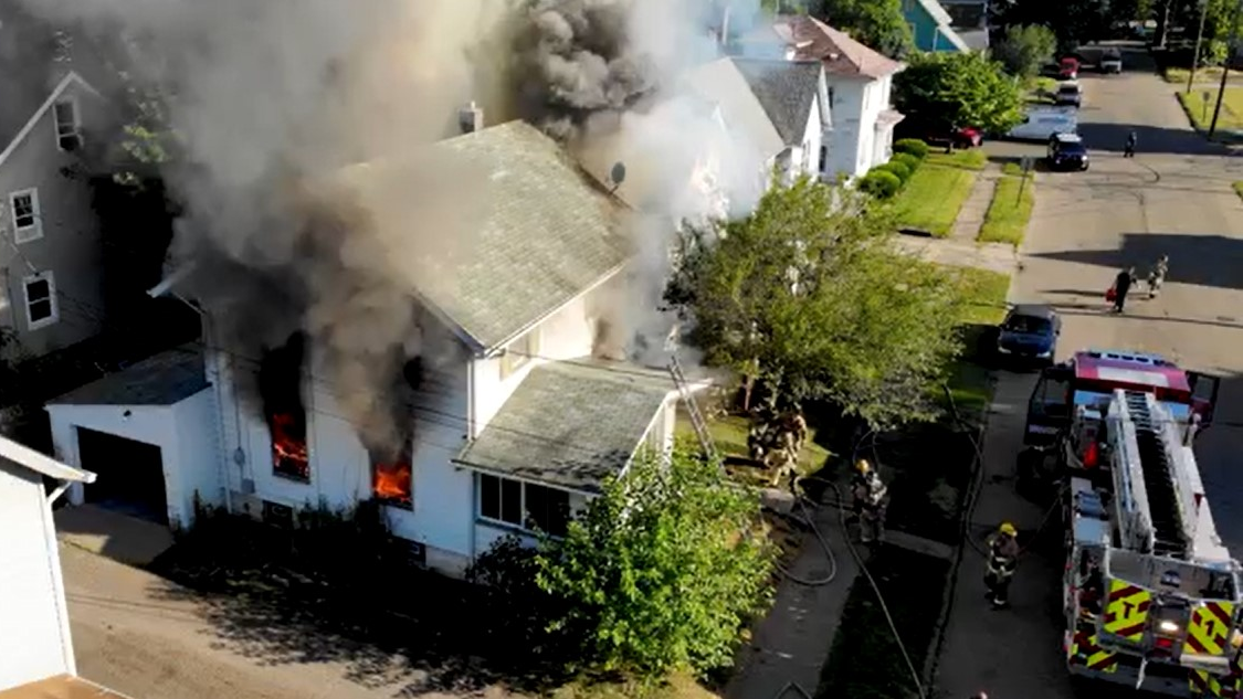 Two Canton, OH, firefighters were taken to the hospital after battling a house blaze Wednesday.