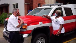 D.C. Fire & EMS Assistant Chief John Donnelly (left) and firefighter Kim Shaw. D.C. Fire & EMS Assistant Chief John Donnelly (left) and firefighter Kim Shaw.