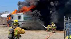 Escondido, CA, firefighters stopped a motor home blaze from reaching nearby industrial fuel tanks Wednesday.
