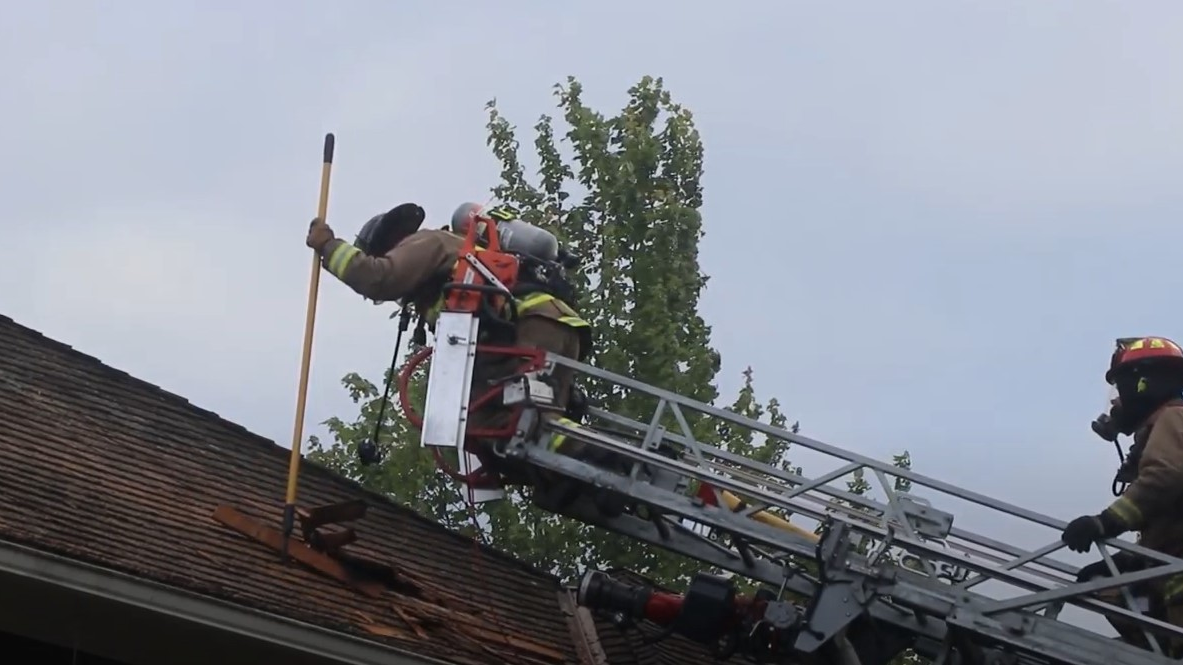 Crews from multiple agencies battled a four-alarm fire that broke out Thursday at an apartment complex under construction near the waterfront in Everett, WA.