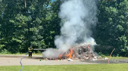 Hazle Township, PA, firefighters quickly extinguished a pile of burning trash that caught fire on a garbage truck and was dumped by the driver Tuesday.