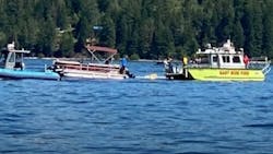 An East Side Fire District boat and other authorities search Lake Coeur d’Alene in north Idaho after two airplanes sank i the waters following a mid-air collision Sunday. An East Side Fire District boat and other authorities search Lake Coeur d’Alene in north Idaho after two airplanes sank i the waters following a mid-air collision Sunday.