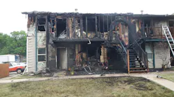 Lee's Summit, MO, firefighters rescued an adult who lowered a 4-year-old child from a balcony to a bystander after an apartment building caught fire Tuesday.
