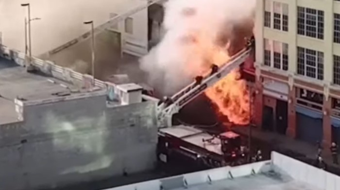 Twelve Los Angeles firefighters were trapped and injured in an explosion at a commercial building in May.