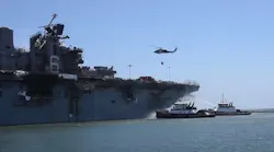 Firefighters continue battling a 'major fire' aboard the USS Bonhomme Richard on Tuesday in San Diego.