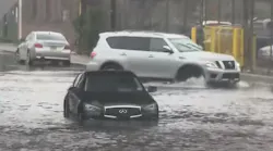 Newark, NJ, firefighters rescued 18 people from flooding caused by Tropical Storm Fay on Friday.