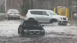 Newark, NJ, firefighters rescued 18 people from flooding caused by Tropical Storm Fay on Friday.