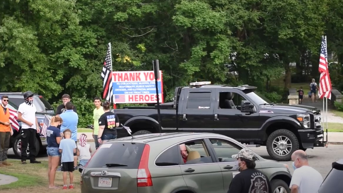 Demonstrators held a rolling rally Thursday calling for the mayor of Newton, MA, to reverse her decision about removing a 'Thin Red Line' flag from the fire department's Station 4.