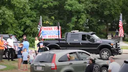 Demonstrators held a rolling rally Thursday calling for the mayor of Newton, MA, to reverse her decision about removing a 'Thin Red Line' flag from the fire department's Station 4.