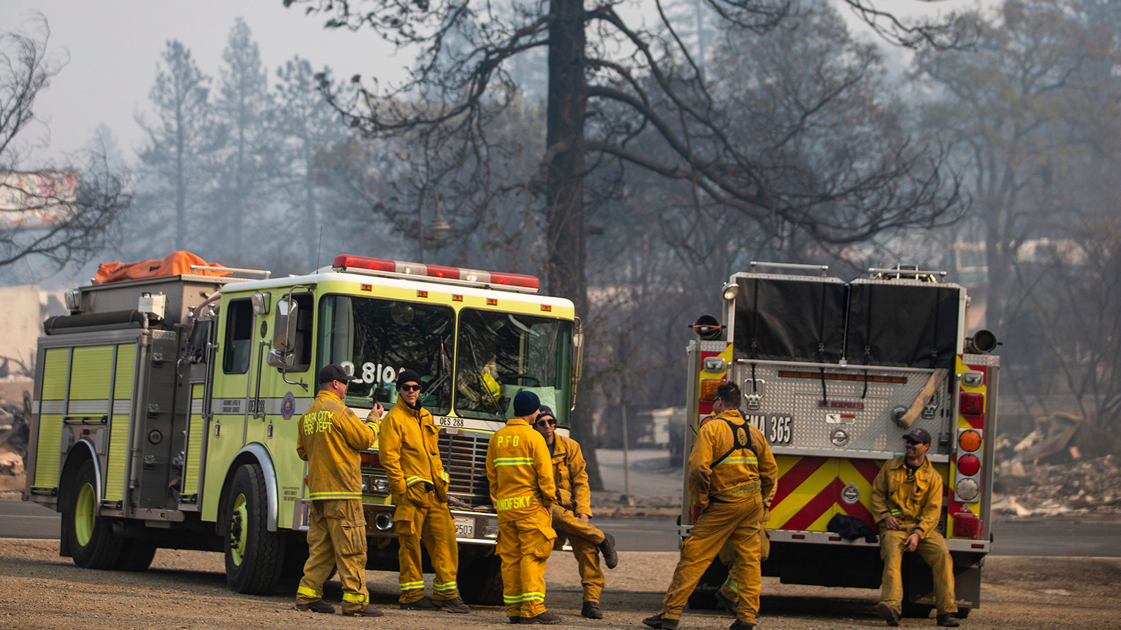 Firefighters await orders at a lot in Paradise, CA, on Nov. 17, 2018.