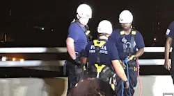 Firefighters from Peoria's technical rescue team saved a man threatening to jump from the Bob Michel Bridge on Saturday.