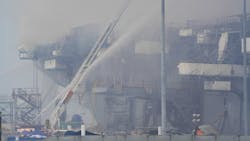 Sailors and federal firefighting teams continued Monday battling a massive blaze that erupted aboard a Navy amphibious assault ship in San Diego. Sailors and federal firefighting teams continued Monday battling a massive blaze that erupted aboard a Navy amphibious assault ship in San Diego.