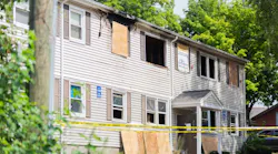 A man, 35, was arrested and charged after allegedly setting his bed on fire inside a public housing unite Tuesday, and a Springfield, MA, firefighter suffered minor injuries in the ensuing blaze.