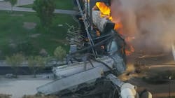 Tempe, AZ, firefighters worked to put out a train fire that ignited following a derailment caused by a partially collapsed bridge Wednesday. Tempe, AZ, firefighters worked to put out a train fire that ignited following a derailment caused by a partially collapsed bridge Wednesday.